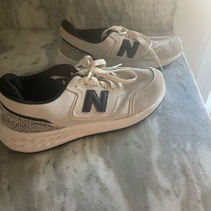 Size 8.5 New Balance neutral sneaker with animal print detail